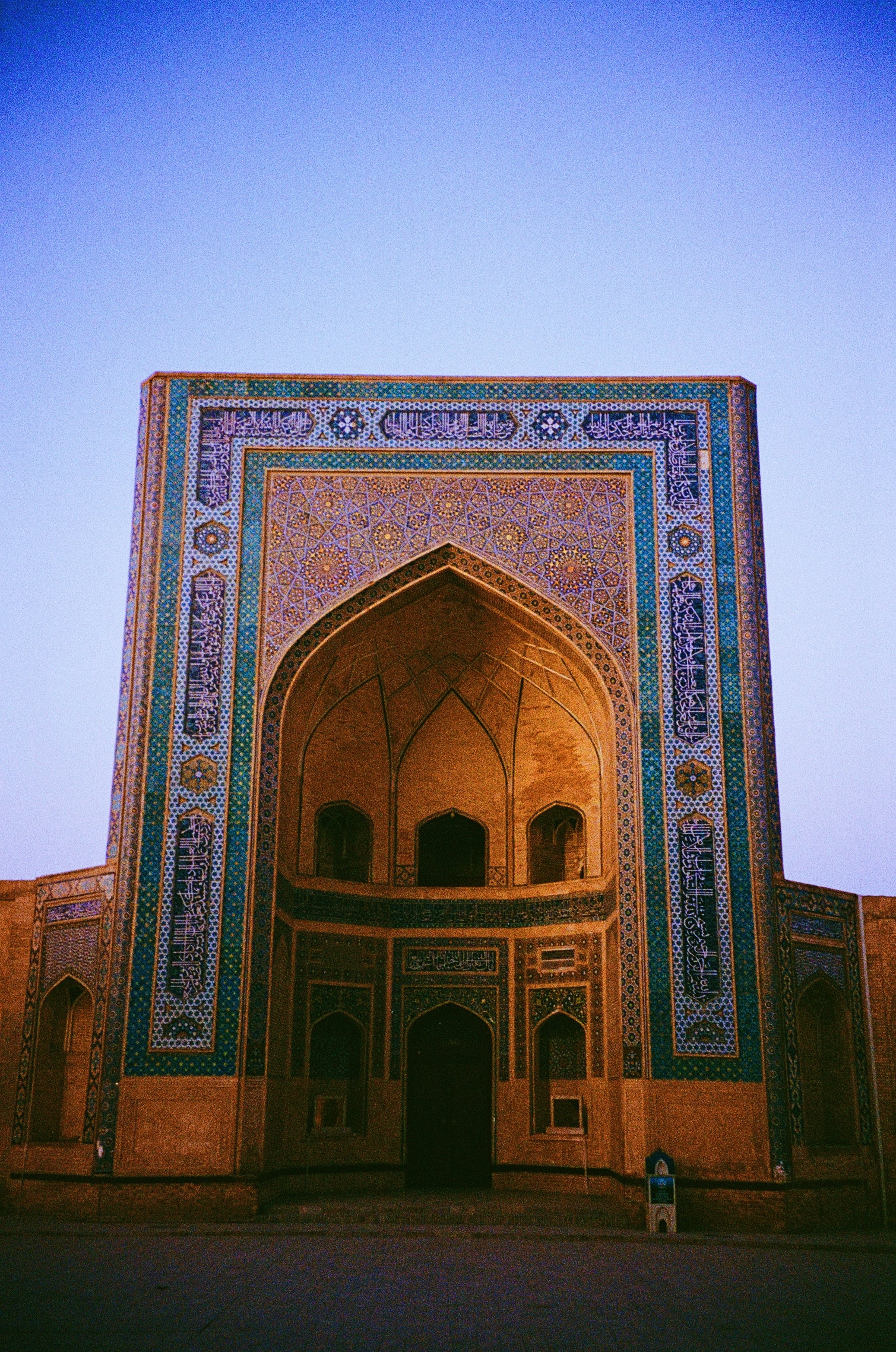 A tiled portal beneath a deep blue sky