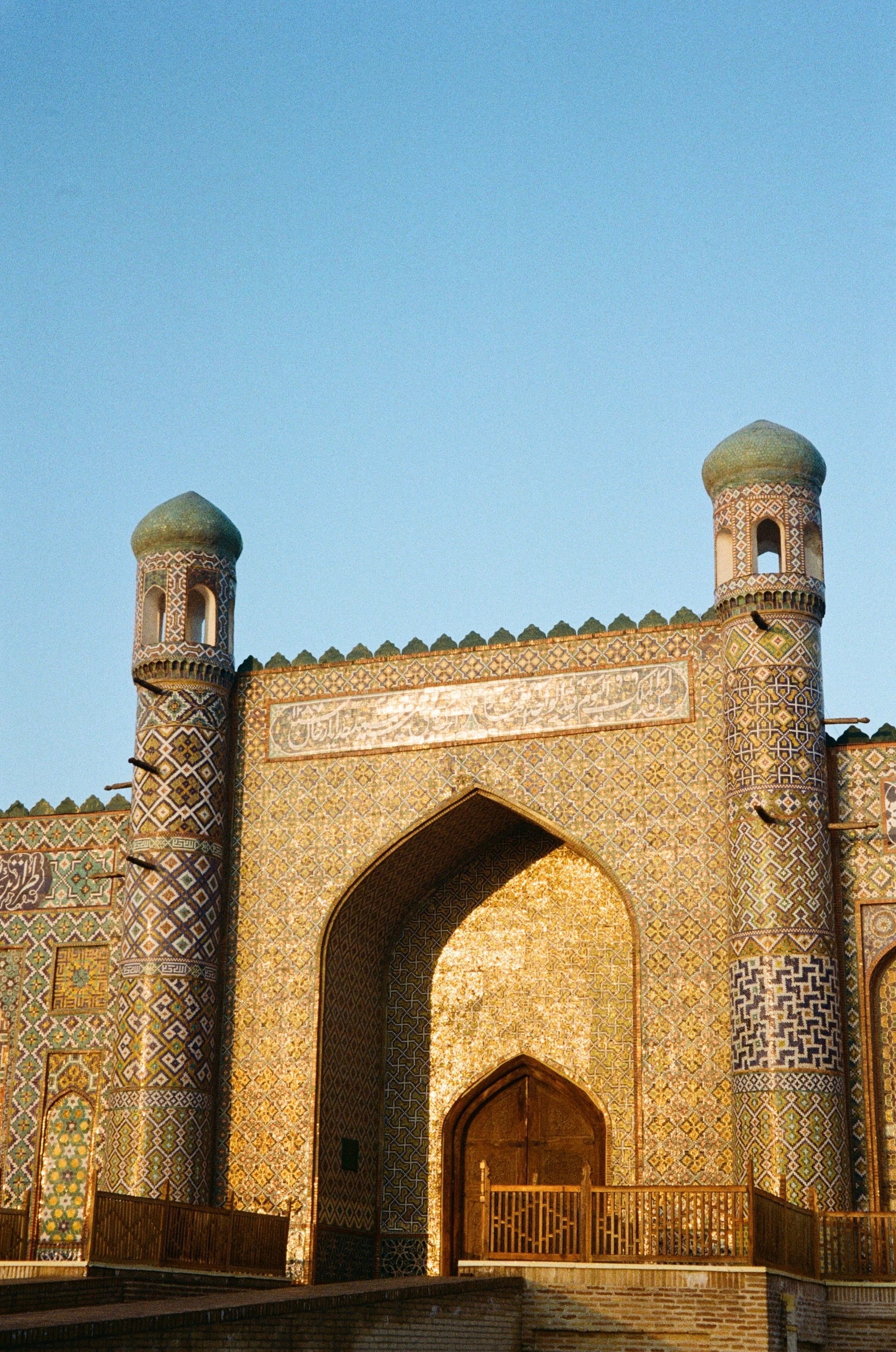 A crenellated gateway between two towers